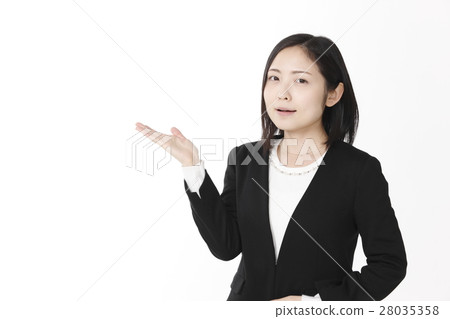Pointing pose business woman 28035358