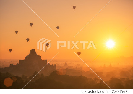 Air balloon over plain of Bagan in misty morning 28035673