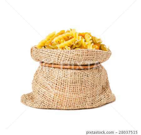 Colorful raw macaroni in sack bag. Colorful raw macaroni in sack bag. 28037515