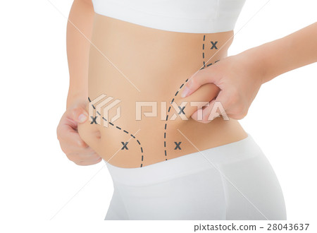 Woman grabbing skin on her hip and belly. 28043637