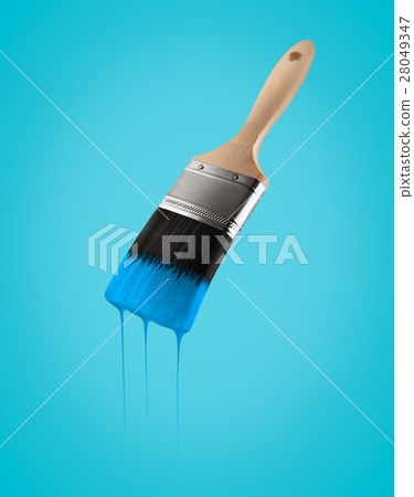 Paintbrush loaded with blue sky color dripping. 28049347