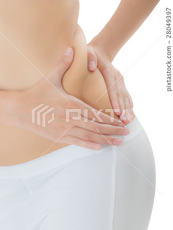 Woman checks and pinching Excess fat on her flank. 28049397