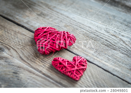 Handmade retro hearts on the wooden background Handmade retro hearts on the wooden background 28049801