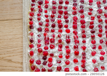 Tart with whipped cream and fresh cranberries 28050126