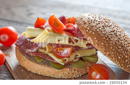 Sandwich with ham, cheese and cherry tomatoes Sandwich with ham, cheese and cherry tomatoes 28050134