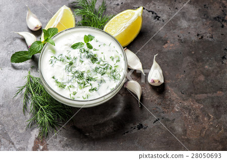 Tzatziki sauce. Fresh dip. Herbs dill mint 28050693
