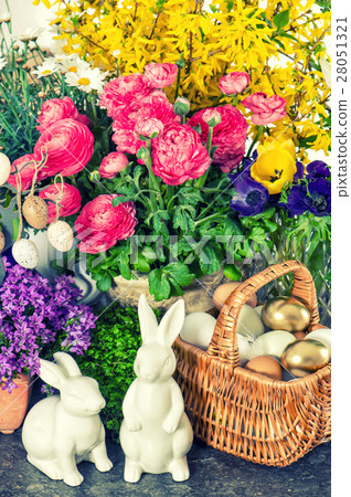 Easter decoration flowers, eggs, bunnies, cake  28051321