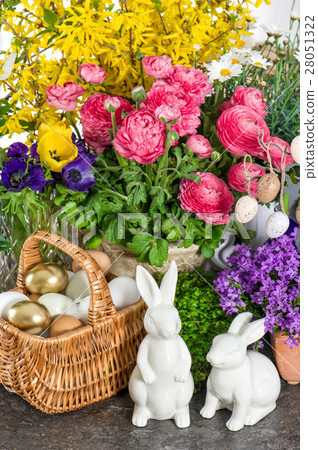 Easter decoration with flowers, eggs, bunnies Easter decoration with flowers, eggs, bunnies 28051322