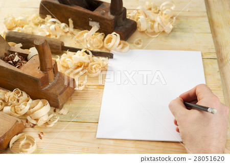 White sheet on wooden table for carpenter tools 28051620