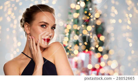 beautiful woman in black over dark background beautiful woman in black over dark background 28052665