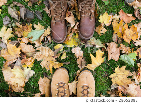 couple of feet in boots and autumn leaves couple of feet in boots and autumn leaves 28052885