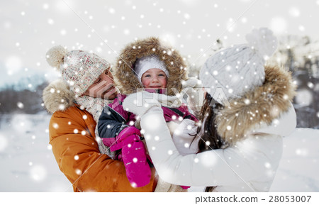 happy family with child in winter clothes outdoors 28053007