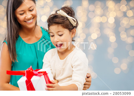 happy mother and child girl with gift box 28053099