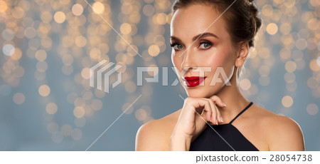 beautiful woman in black over dark background 28054738