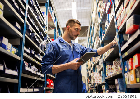 auto mechanic or smith with tablet pc at workshop 28054801