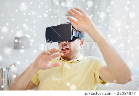 young man in virtual reality headset or 3d glasses young man in virtual reality headset or 3d glasses 28054877