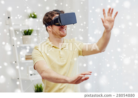 young man in virtual reality headset or 3d glasses young man in virtual reality headset or 3d glasses 28054880