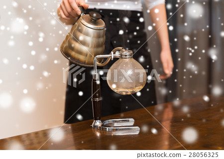 close up of woman with siphon coffee maker and pot close up of woman with siphon coffee maker and pot 28056325