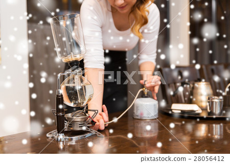 close up of woman with siphon coffee maker and pot close up of woman with siphon coffee maker and pot 28056412