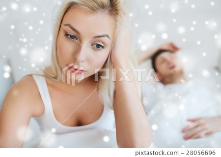awake woman having insomnia in bed awake woman having insomnia in bed 28056696