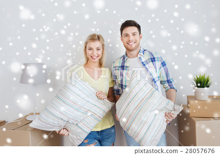 happy couple with stuff moving to new home happy couple with stuff moving to new home 28057676