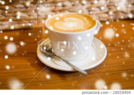 close up of coffee cup with heart shape drawing 28058404