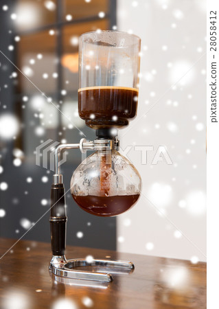 close up of siphon vacuum coffee maker at shop close up of siphon vacuum coffee maker at shop 28058412