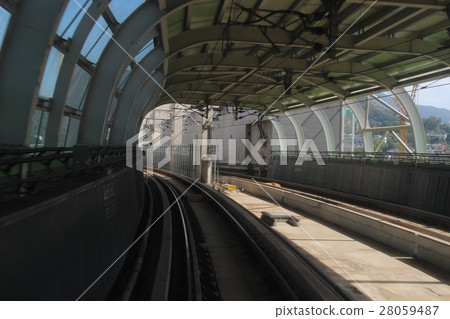 Monorail passing though the tunnel 28059487