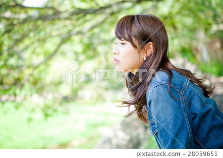 woman in denim jacket woman in denim jacket 28059651