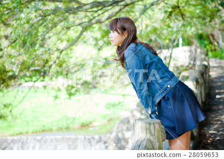 woman in denim jacket 28059653