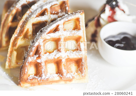 waffle with icing sugar and blueberry dip waffle with icing sugar and blueberry dip 28060241