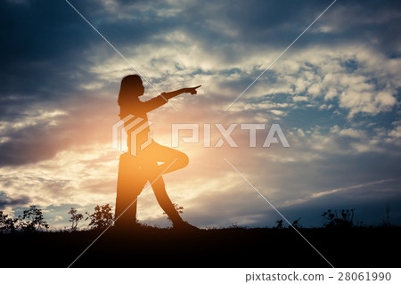 Silhouette woman lifestyle relax at sunset Silhouette woman lifestyle relax at sunset 28061990