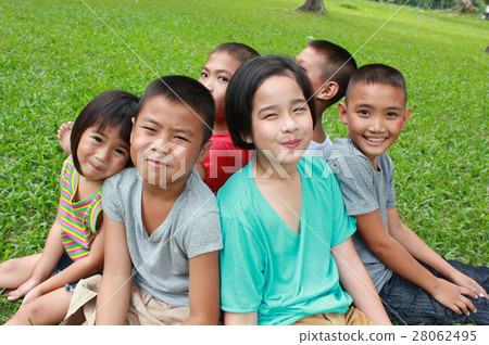 Six children playing in the park, spring time. 28062495