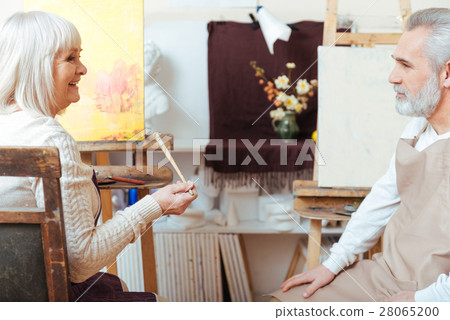 Male and female artists sitting in painting class 28065200