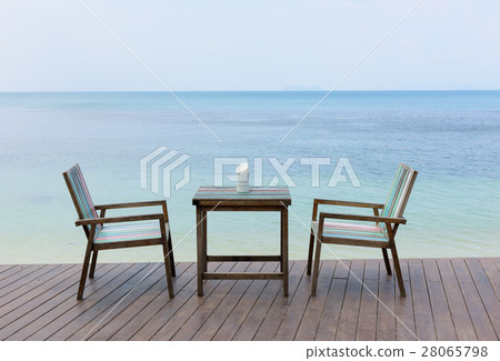 Wooden vintage table set with blue sky and sea Wooden vintage table set with blue sky and sea 28065798