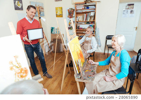 Young man demonstrating a painters diploma Young man demonstrating a painters diploma 28065890