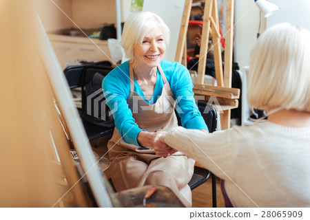 Happy women talking in painting class 28065909