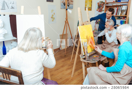 Group of people having lesson in painting school Group of people having lesson in painting school 28065984