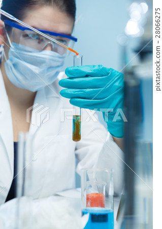 Young technician with chemical substances 28066275