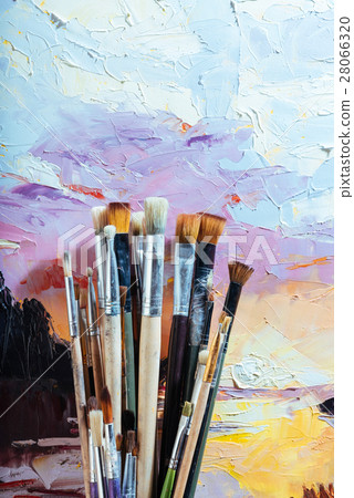 Close up of soft brushes and colorful canvas Close up of soft brushes and colorful canvas 28066320