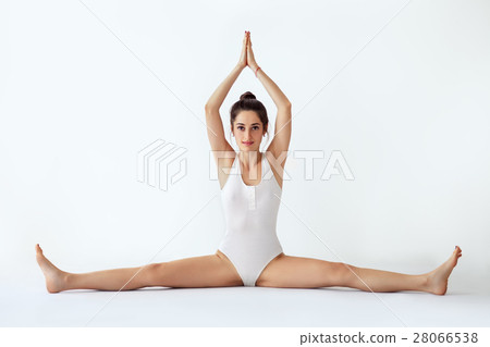 Young woman doing yoga asana samakonasana 28066538