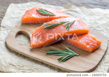 Raw salmon on the wooden board 28069750