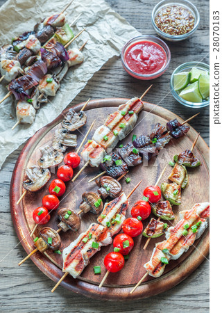 Grilled chicken and vegetables skewers Grilled chicken and vegetables skewers 28070183