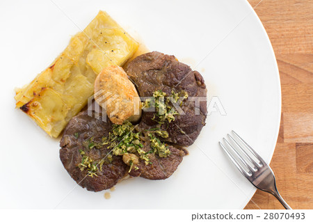 Rack of Lamb with peas and potatoes Rack of Lamb with peas and potatoes 28070493