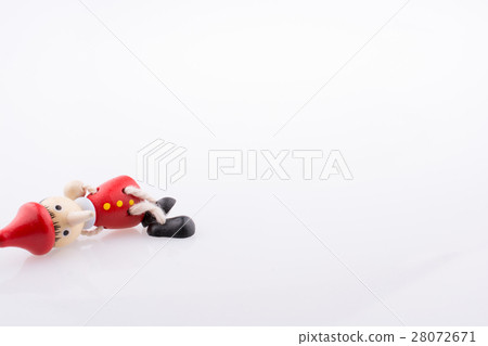 Wooden pinocchio doll with his long nose Wooden pinocchio doll with his long nose 28072671