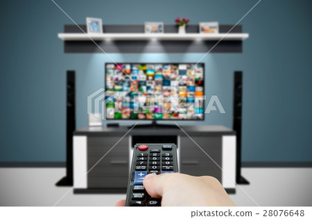Watching television in modern TV room. 28076648