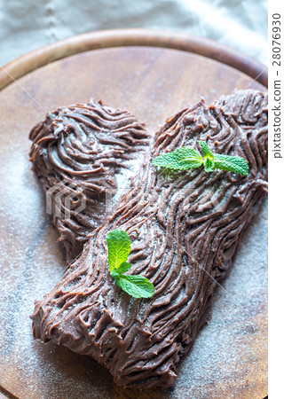 Yule log on the wooden board 28076930