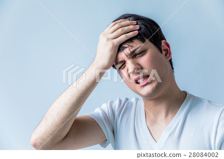 A man with a headache A man with a headache 28084002