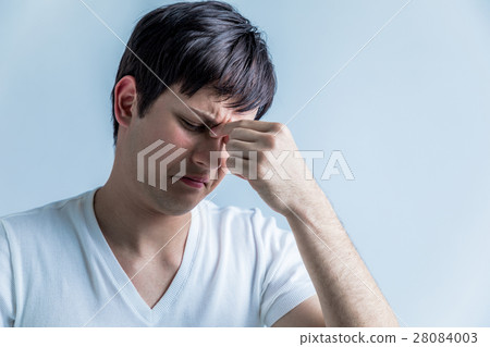 A man with a headache A man with a headache 28084003