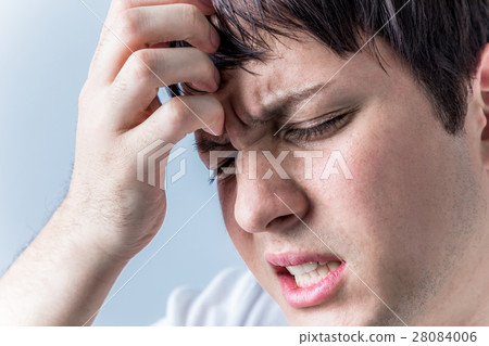 A man with a headache A man with a headache 28084006